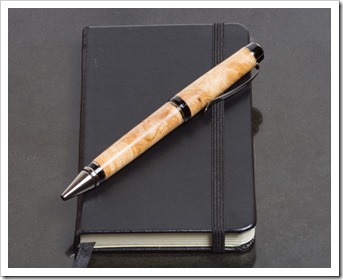 Notebook or journal and pen